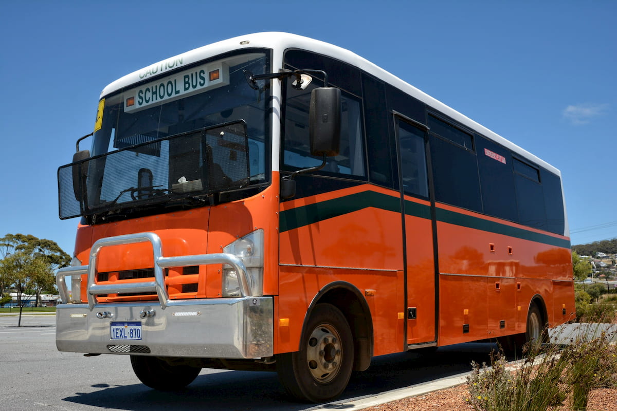 School bus orange Isuzu 34 seat coach